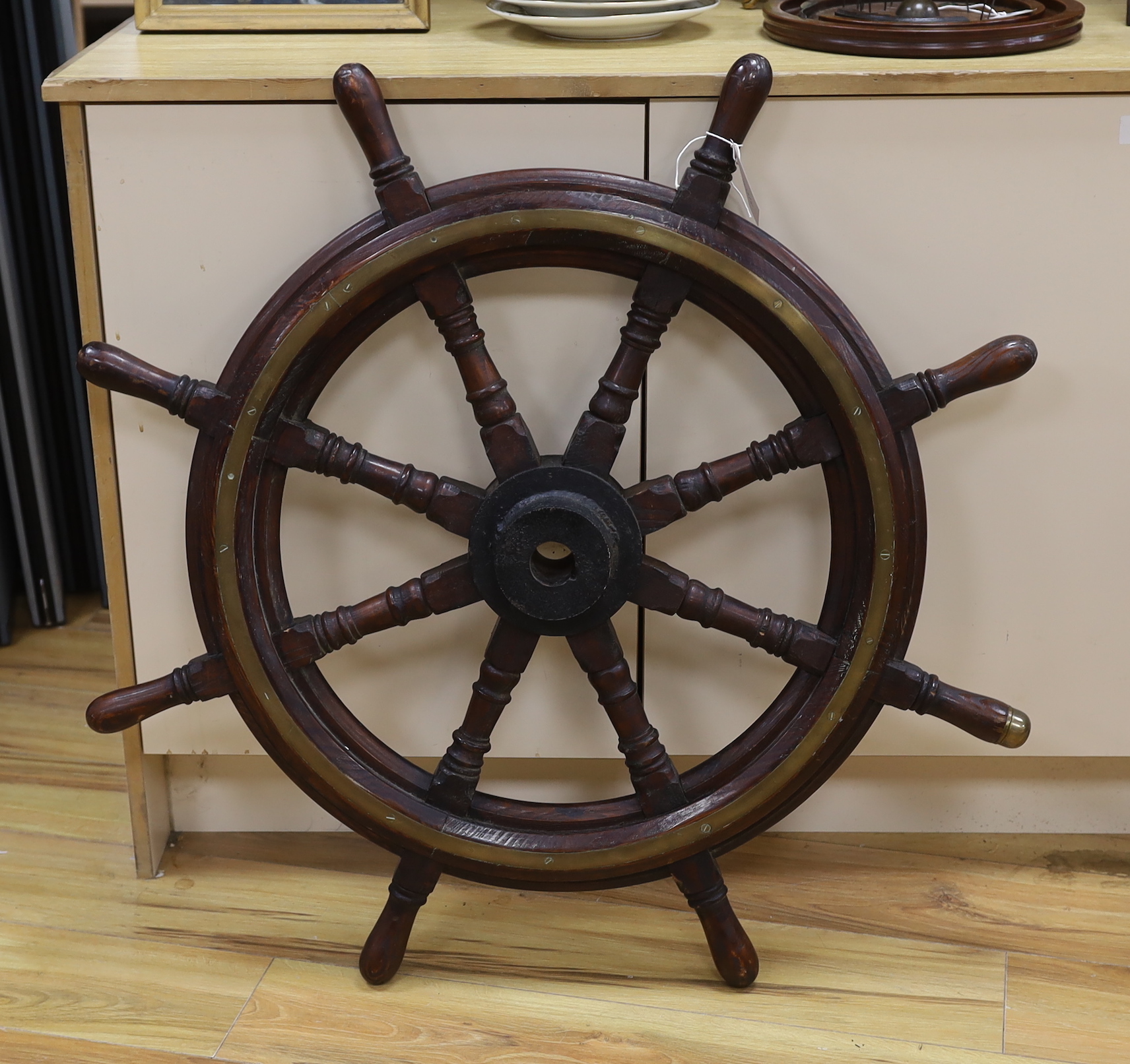 A pine and brass mounted ship's wheel, 93cm in diameter